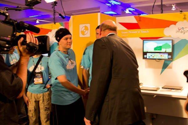 Steve Ballmer, then CEO of Microsoft, shaking hands with Riley's team Dream'n'Touch at their demo stand